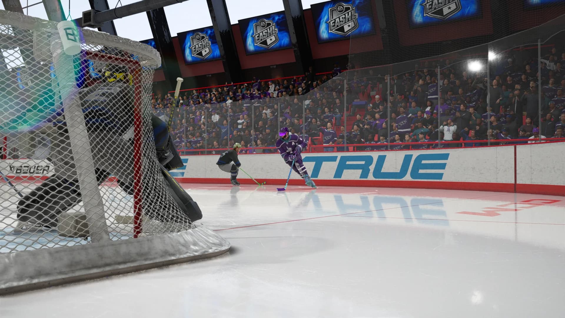 Matt Hut Carrying the Puck Behind the Net