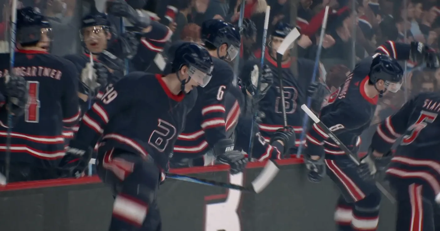 Bardownski teammates celebrating together at the bench